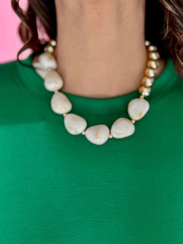 It's a Neutral Beaded Necklace